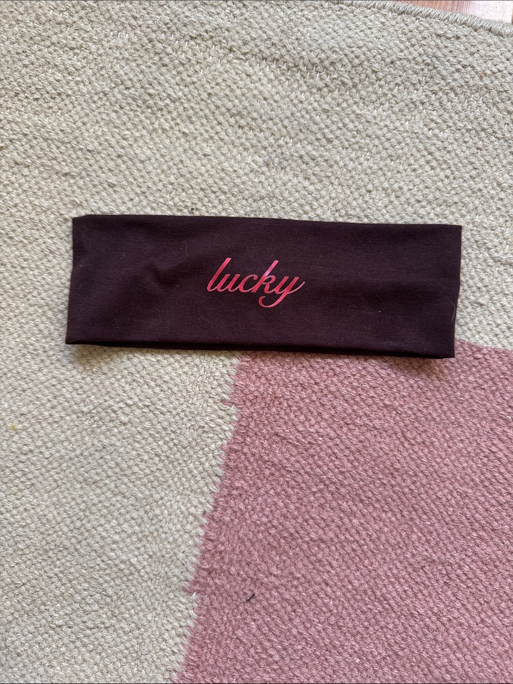 “Lucky” Brown Headband with red lucky' Script
